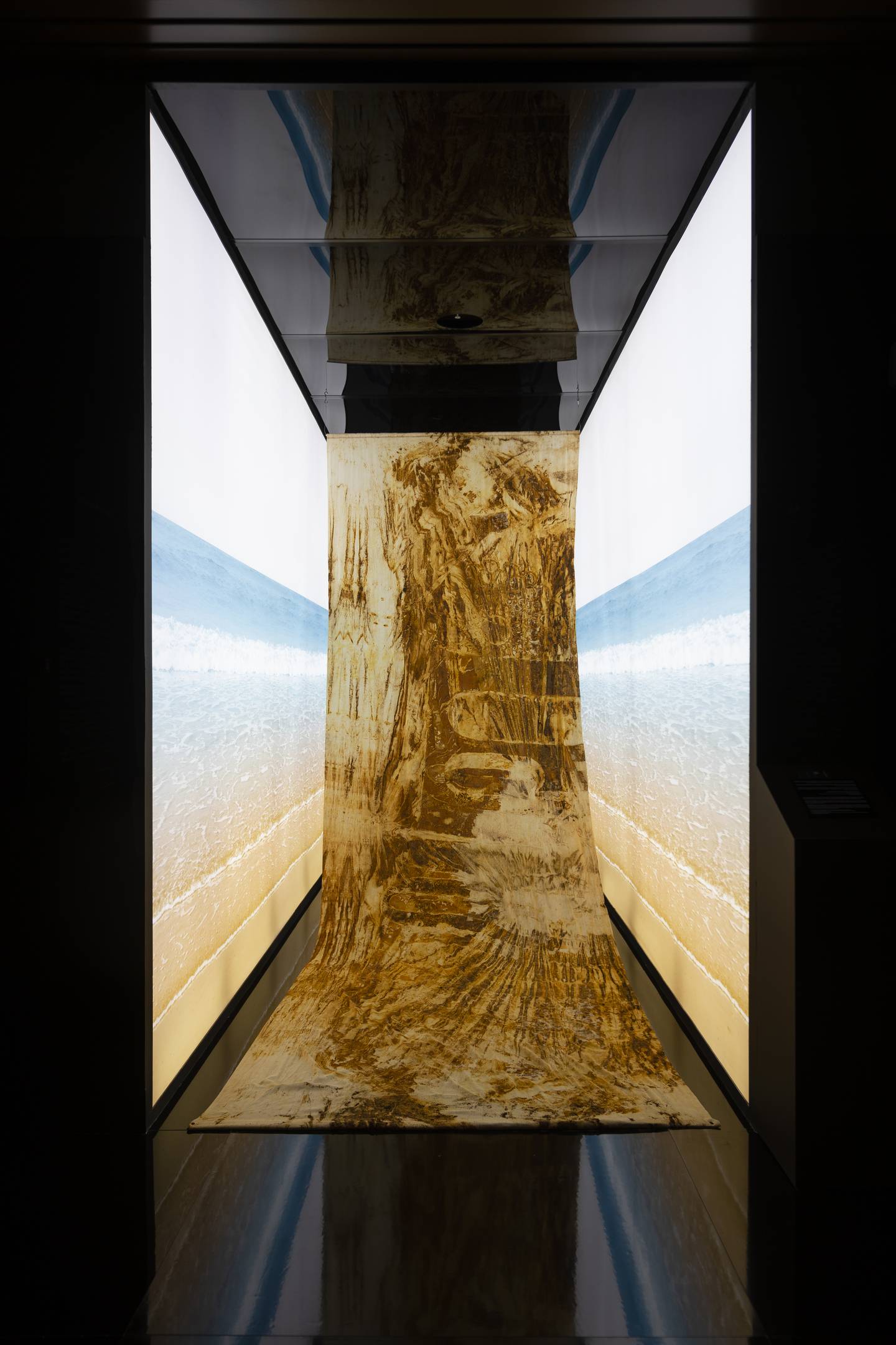 The welcoming work at the exhibition space features Al Astad's danat al shawati technique in silk. Photo: Cultural Foundation