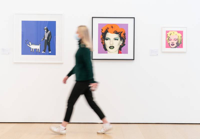 A portrait of model Kate Moss by reclusive graffiti artist Banksy went on view at Phillips auction house in central London on Wednesday. The portrait will be on display until 19 January, ahead of its sale at auction, with an estimate of £130,000 to £180,000. PA