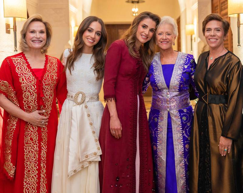 Jordan's Queen Rania with, from left, Princess Aisha bint Hussein, Princess Iman, Princess Muna Al Hussein and Princess Zein bint Hussein at a henna ceremony before the wedding. AFP 