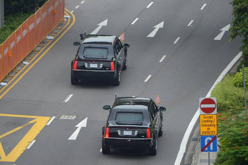 The motorcade carrying US President Donald Trump sets off to Sentosa, the resort island where Trump is scheduled to meet with North Korea's leader Kim Jong Un for a US-North Korea summit, in Singapore on June 12, 2018. Donald Trump and Kim Jong Un will make history on June 12, becoming the first sitting US and North Korean leaders to meet, shake hands and negotiate to end a decades-old nuclear stand-off. / AFP / Ted ALJIBE
