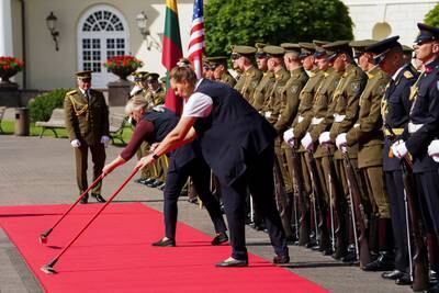 The red carpet is prepared for Mr Biden's arrival at the Presidential Palace in Vilnius. Reuters