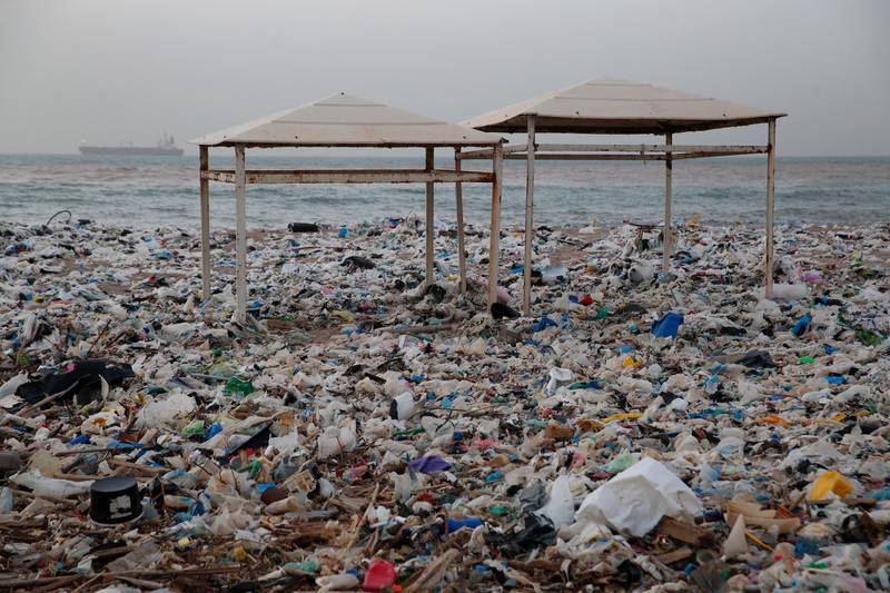 Two tents sit in piles of garbage covering the shore days after an extended storm battered the Mediterranean country at the Zouq Mosbeh coastal town north of Beirut. Hussein Malla / AP