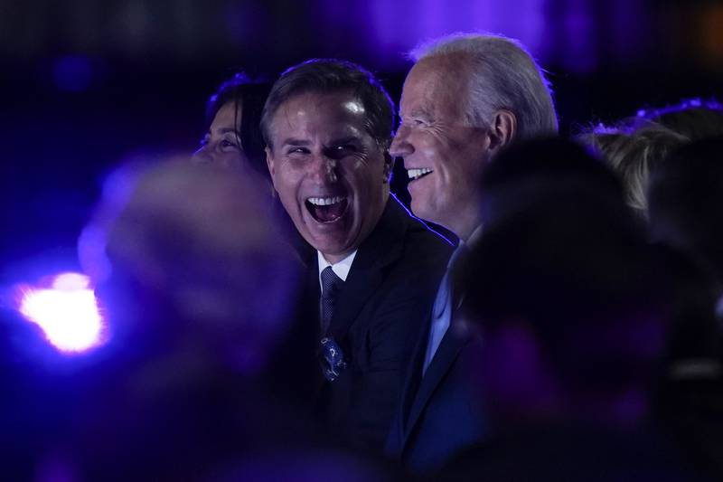 Paul Buccieri, president and chairman of A+E Networks Group and Mr listen as Elton John performs one of his many hit songs. AP