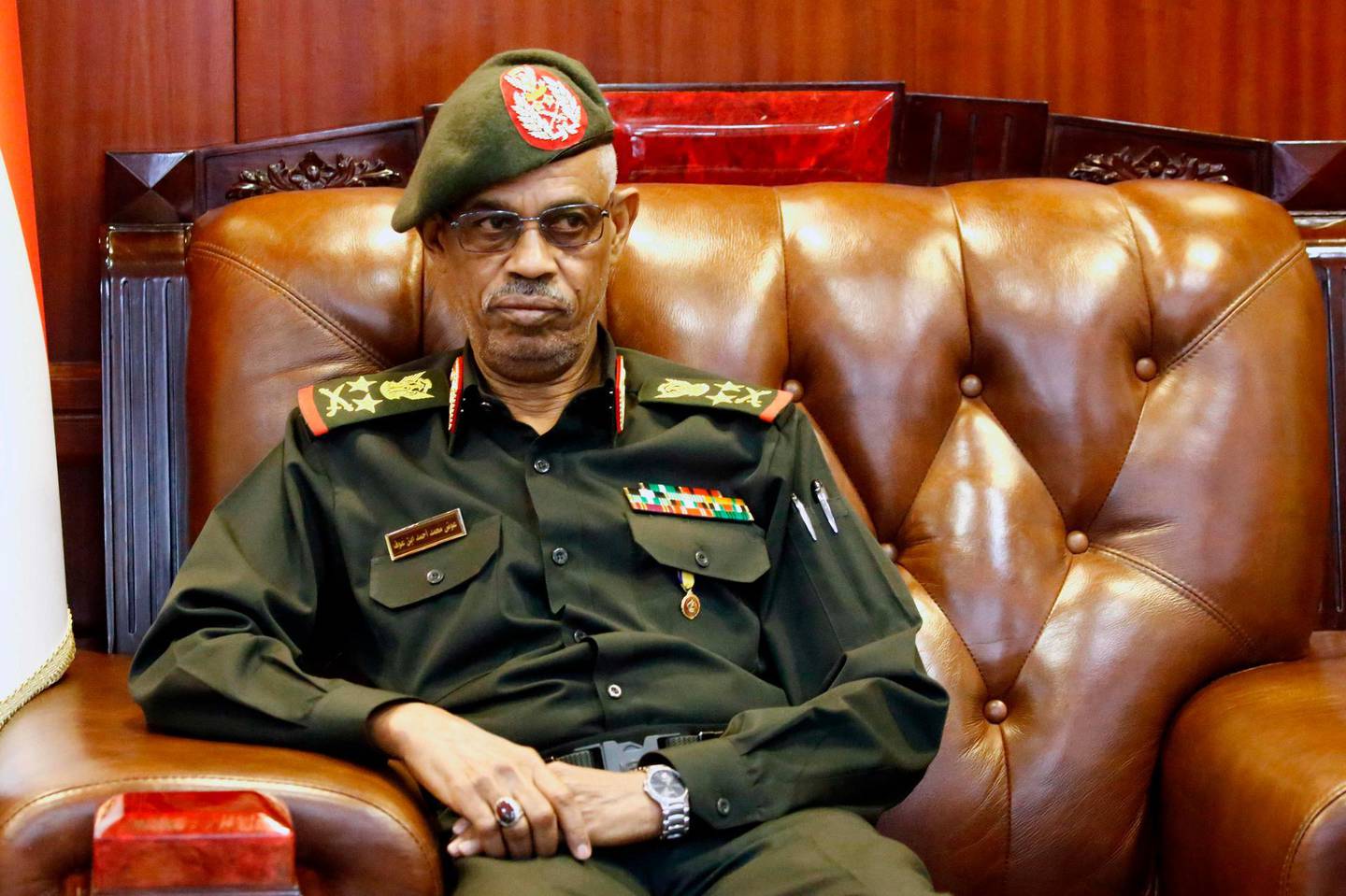 (FILES) This file picture dated on November 25, 2018 shows Sudanese Defence Minister Ahmed Awad Ibn Ouf in Khartoum. Sudan's military council chief General Awad Ibn Ouf announced on April 12 he was stepping down in favour of General Abdel Fattah al-Burhan Abdulrahman to succeed him, just a day after he was sworn in following the ouster of veteran president Omar al-Bashir. Ibn Ouf also said that before stepping down he had fired his deputy in the council Lieutenant General Kamal Abdelmarouf. - 
 / AFP / ASHRAF SHAZLY
