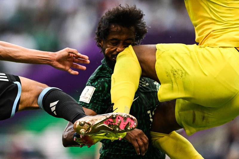Yasser Al Shahrani 8: Had large Saudi contingent in stands on their feet with one sliding challenge to win ball in first half and was perfect example of effort his team put into this game. Took horrific knee to face off own keeper late on and had to be carried off. AFP