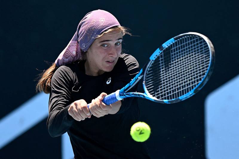 Meshkatolzahra Safi of Iran during a girls doubles match at the Australian Open. AFP
