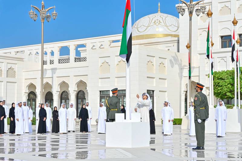 Sheikh Mansour bin Zayed, Deputy Prime Minister and Minister of the Presidential Court, raises the UAE flag at Abu Dhabi’s Qasr Al Watan. Wam