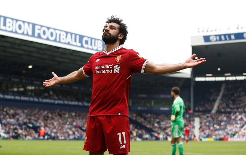 Soccer Football - Premier League - West Bromwich Albion v Liverpool - The Hawthorns, West Bromwich, Britain - April 21, 2018   Liverpool's Mohamed Salah celebrates scoring their second goal            REUTERS/Andrew Yates    EDITORIAL USE ONLY. No use with unauthorized audio, video, data, fixture lists, club/league logos or "live" services. Online in-match use limited to 75 images, no video emulation. No use in betting, games or single club/league/player publications.  Please contact your account representative for further details.