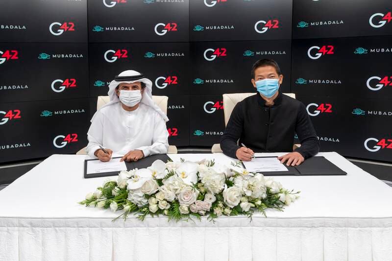 Musabbeh Al Kaabi (left), chief executive of UAE Investments at Mubadala, and Peng Xiao, group chief executive of G42, during the signing of the pact to establish a biopharmaceutical manufacturing campus in Abu Dhabi. Photo: G42