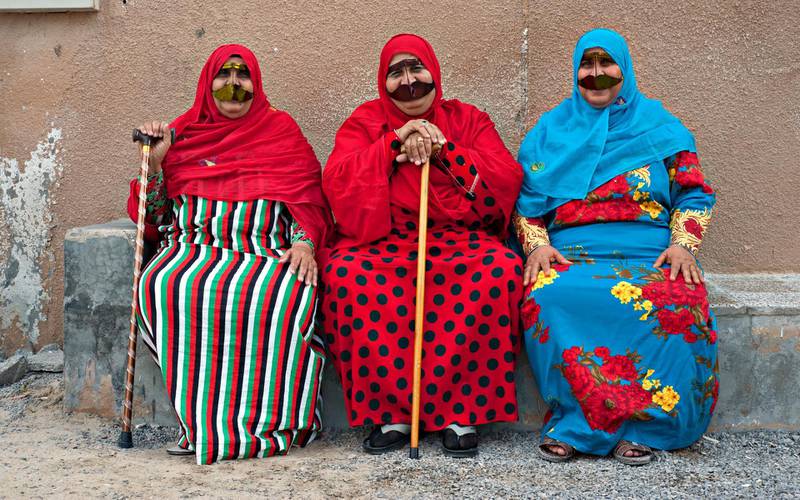 Aisha Saeed Hassan, far left, moved from her mountain home into modern housing in Al Jeer in the 1980s on the same day as her neighbours Fatima Saeed Rashed and Maryam Zaidi Ali. Photos courtesy Jeff Topping
