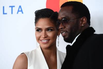 Singer and model Cassie and rap mogul Sean 'Diddy' Combs attend a party on the eve of the 60th Grammy Awards in 2018. AFP