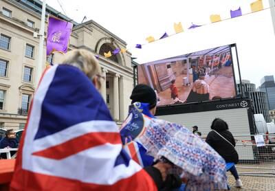 Catching the coronation on a big screen in Centenary Square, Birmingham. Getty Images