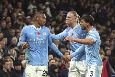 Manchester City's Manuel Akanji, left, celebrates with Erling Haaland, centre, Ruben Dias after scoring his side's second goal. AP 