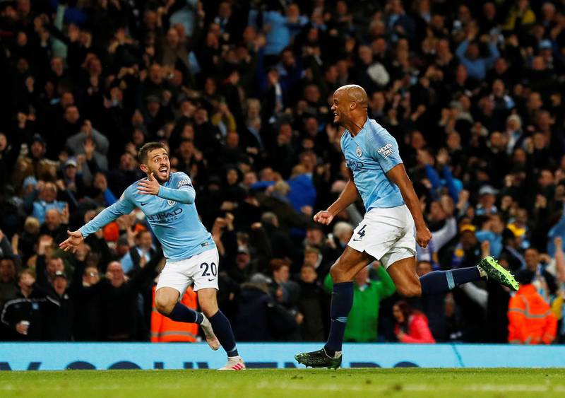 Vincent Kompany celebrates after scoring the only goal of the game for Manchester City. Reuters