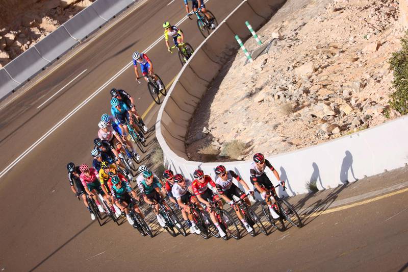 Riders compete during stage 7 of the United Arab Emirates cycling tour, from Al Jahili Fort to Jebel Hafeet, on February 26, 2022.  (Photo by Giuseppe CACACE  /  AFP)