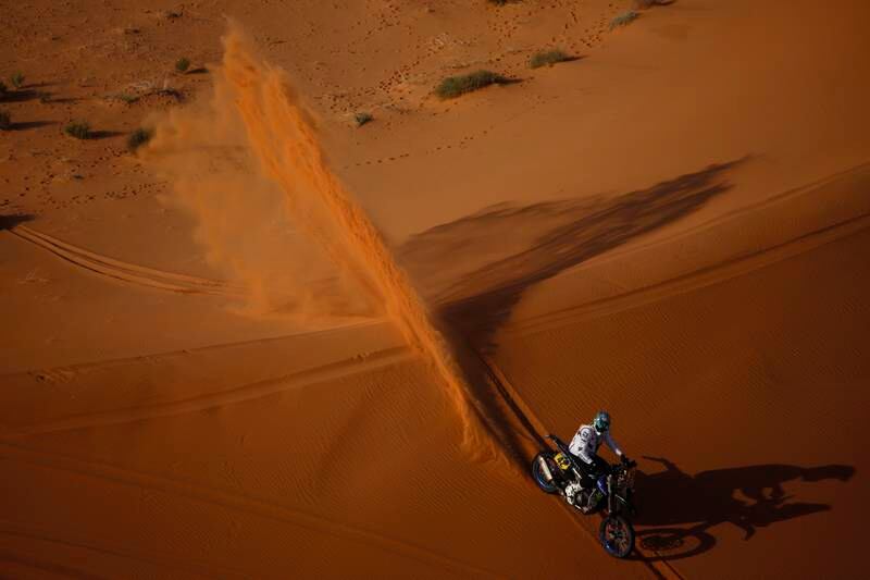 French rider Adrien Van Beveren tackles the sand dunes. EPA