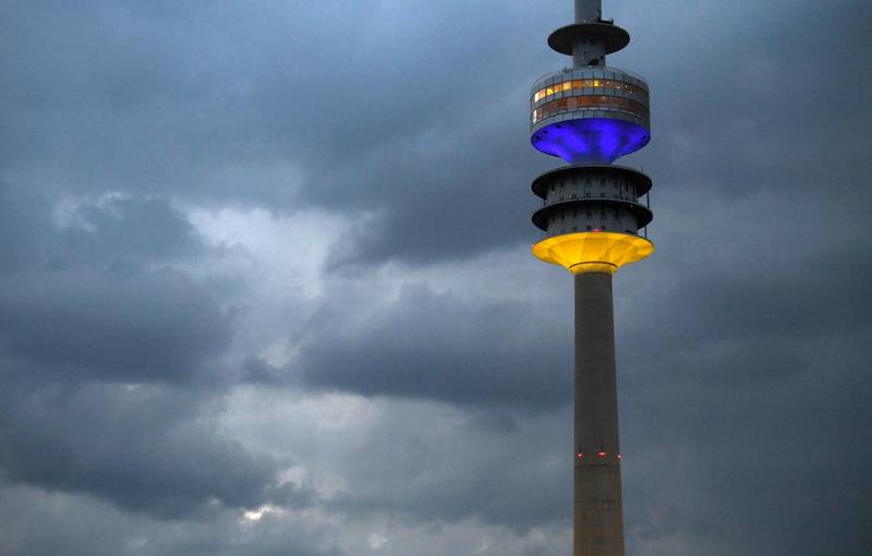 The television tower is illuminated in the national colors of the Ukrainian flag to show solidarity with the country at the Olympic Park in Munich, southern Germany. AFP