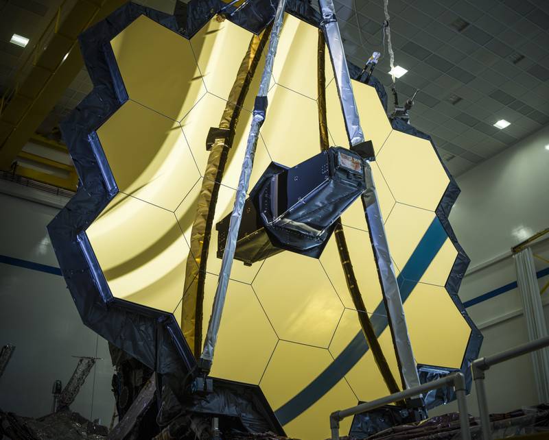 The main mirror assembly of the James Webb Space Telescope. Webb will attempt to look back in time 13 billion years, a mere 100 million years after the Big Bang. AP