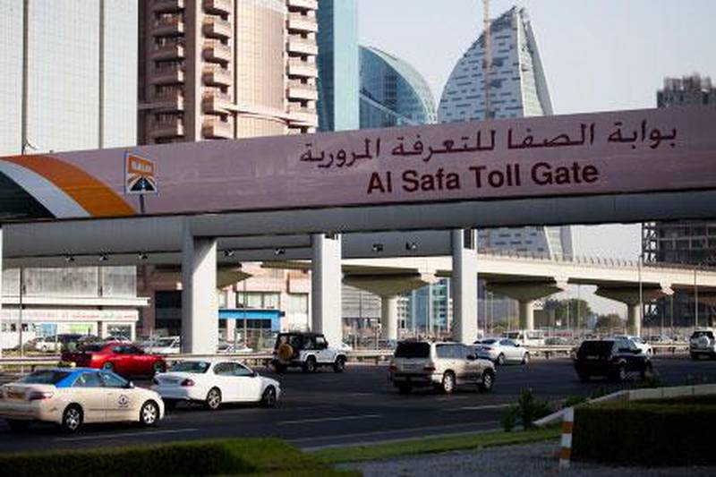 Dubai, June 27, 2012 --  Stock photographs of cars driving through Al Safa Salik Toll Gate on Sheikh Zayed Road in Dubai, June 27 2012. (Photo by: Sarah Dea/The National)