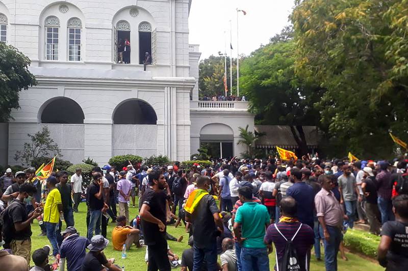 Protesters gather inside the compound of Sri Lanka's Presidential Palace in Colombo. AFP