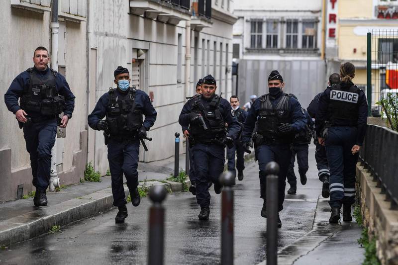 French police arrive at the site of the attack. AFP