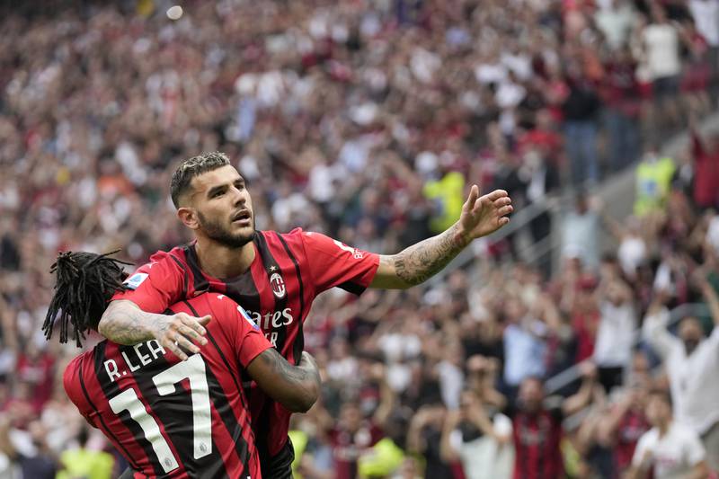 AC Milan's Theo Hernandez celebrates with Rafael Leao, left, after scoring his side's second goal against Atalanta at the San Siro. AP Photo