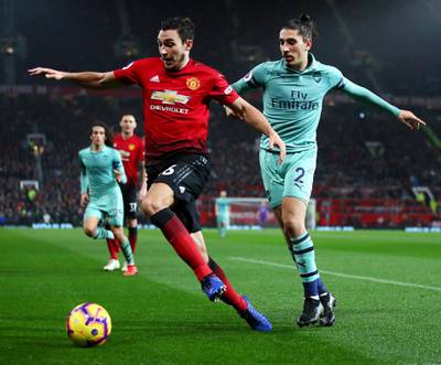 MANCHESTER, ENGLAND - DECEMBER 05:  Matteo Darmian of Manchester United battles for possession with Hector Bellerin of Arsenal during the Premier League match between Manchester United and Arsenal FC at Old Trafford on December 5, 2018 in Manchester, United Kingdom.  (Photo by Clive Brunskill/Getty Images)