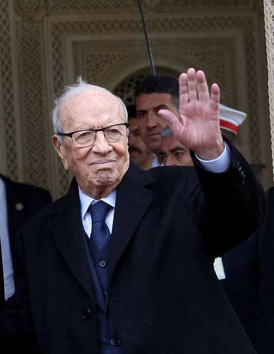 FILE PHOTO: Tunisia's President Beji Caid Essebsi gestures to photographers at Carthage Palace in Tunis, Tunisia, December 27, 2017. REUTERS/Zoubeir Souissi/File Photo