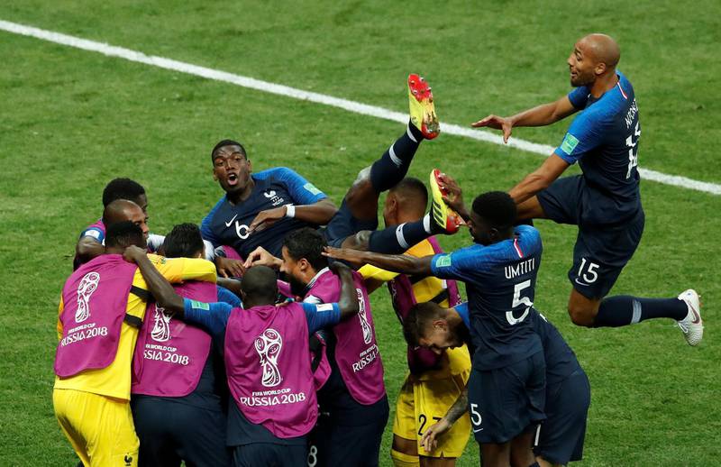 Kylian Mbappe celebrates with team mates after scoring the fourth goal. Reuters
