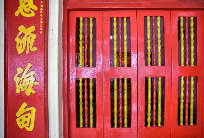 The distinctive red and yellow decoration of Choonghee Dong Thien Haue temple in Kolkata.