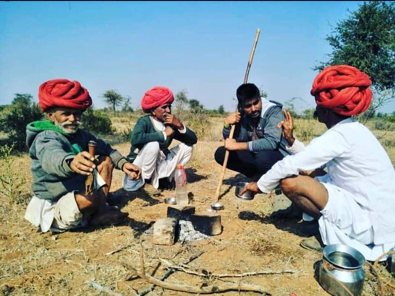 Rabari men traditionally wear white dhotis, red turbans and silver amulets. Courtesy Jawai Wild Camp 