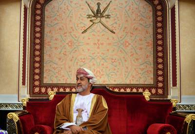 FILE - In this Feb. 21, 2020 file photo, Oman's ruler Sultan Haitham bin Tariq prepares for a meeting at al-Alam palace in the capital Muscat, Oman. The sultan announced Monday, Jan. 11, 2021, a shake-up of the countryâ€™s constitution with changes that include the appointment of a crown prince for the first time and steps to boost government transparency. The move, one year after the death of Sultan Qaboos bin Said comes as the government faces growing economic pressures at home. (Andrew Caballero-Reynolds/Pool via AP, File)