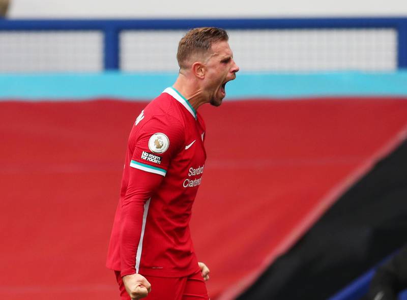 Jordan Henderson celebrates after scoring what he thought was a last-gasp winner for Liverpool, only for VAR to rule it out. Reuters
