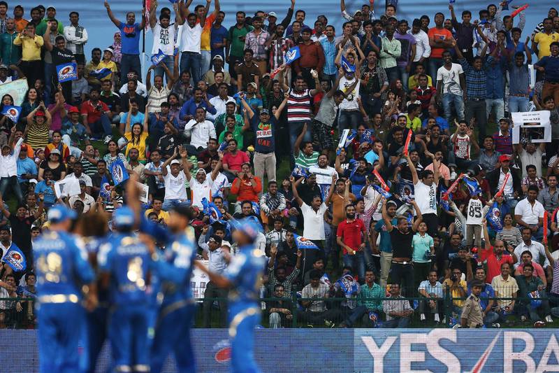 ABU DHABI , UNITED ARAB EMIRATES Ð April 16 , 2014 : Crowd watching the IPL opening match between Mumbai Indians vs Kolkata Knight Riders at Zayed Cricket Stadium in Abu Dhabi. ( Pawan Singh / The National ) For Sports. Story by Osman