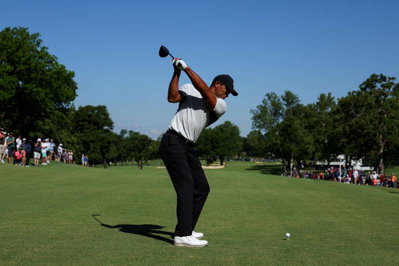 Tiger Woods plays his shot from the 16th tee during a practice round prior to the start of the 2022 PGA Championship. AFP
