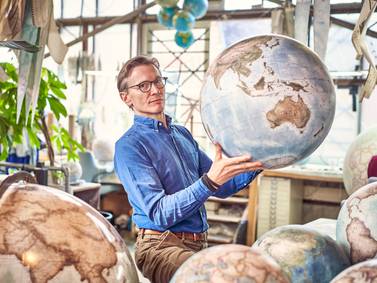 The globemaker with the whole world in his hands - and not just Earth
