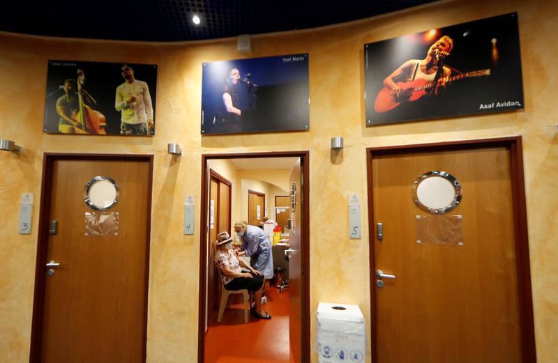 A senior citizen receives a coronavirus vaccine at the Theatre de Verdure in Nice, France, which has been transformed into a vaccination centre. Reuters