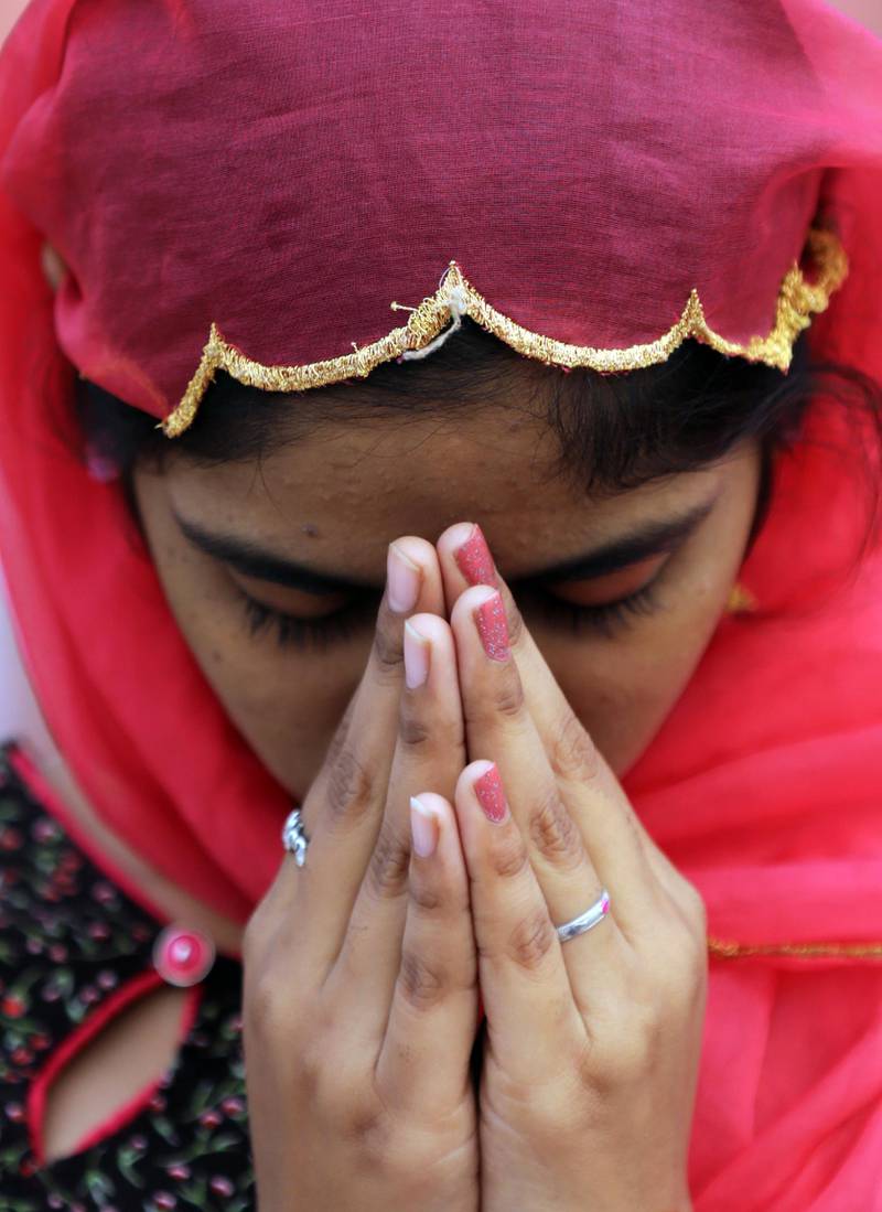 A devotee prays at the Golden Temple, the holiest of Sikh places on the occasion of the 550th birth anniversary of the first Sikh Guru or master, Sri Guru Nanak Dev Ji in Amritsar, India, 12 November 2019. EPA