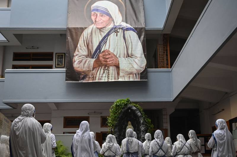 Nuns from the Missionaries of Charity attend a special prayer to mark the 111th birth anniversary of Mother Teresa in Kolkata in August. AFP