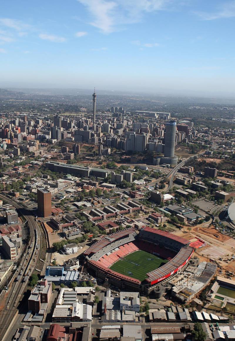 JOHANNESBURG, SOUTH AFRICA - AUGUST 31:  The city skyline rises beyond Ellis Park Stadium, one of the venues for the 2010 Fifa World Cup, on August 31, 2008 in Johannesburg, South Africa.  (Photo by David Rogers/Getty Images)