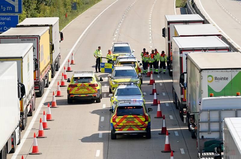 Lorries queue to enter the Port of Dover, in Kent, south-east England, amid security checks in the search for Daniel Khalife. PA 