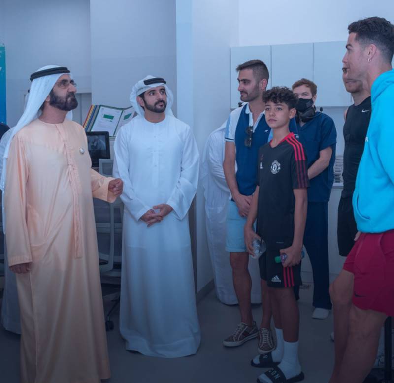 Sheikh Mohammed bin Rashid, the Vice President and Ruler of Dubai, and Crown Prince Sheikh Hamdan bin Mohammed chat with footballer Cristiano Ronaldo, right. Photo: Sheikh Hamdan / Instagram