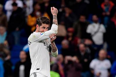 Real Madrid's Spanish defender Sergio Ramos reacts at the end of the Spanish league football match between Real Madrid CF and FC Barcelona at the Santiago Bernabeu stadium in Madrid on March 2, 2019. / AFP / JAVIER SORIANO
