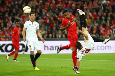 Kevin Gameiro of Sevilla shoots at goal with an overhead kick. Michael Steele/Getty Images
