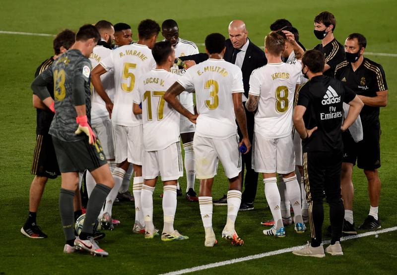 Zinedine Zidane gives instructions to the Real players. Getty