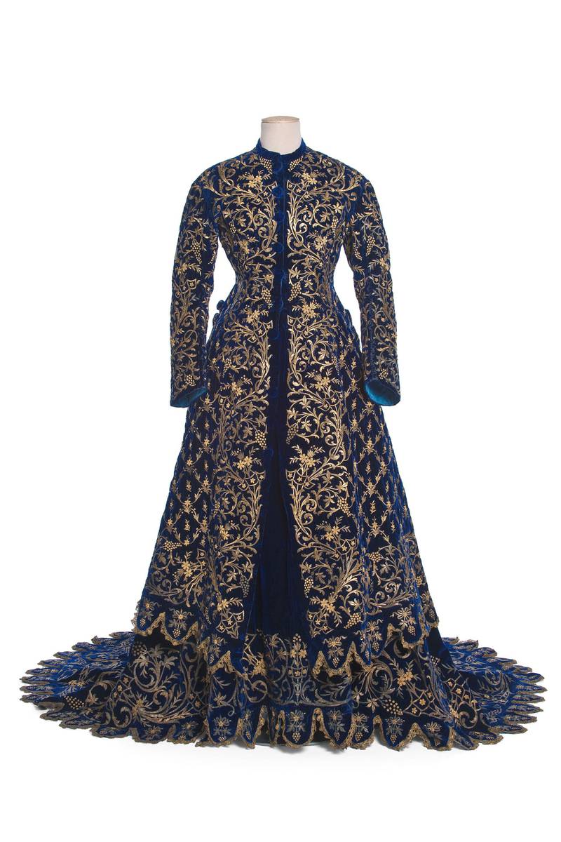 Dress in two parts, circa 1867, sapphire silk velvet embroidered in gold thread with bercelé rinceaux and grape-bunch motifs, with goldlace trim. Courtesy: Musée des Arts Décoratifs, gift of E. Hayaux du Tilly, 1935