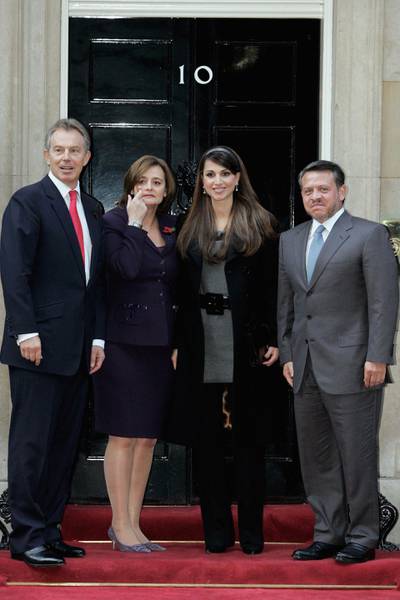 LONDON - NOVEMBER 06:  British Prime Minister Tony Blair and his wife Cherie pose with King Abdullah and Queen Rania of Jordan on the steps of 10 Downing Street on November 6, 2006 in London, England. King Abdullah and Queen Rania will meet British Chancellor Gordon Brown, and HRH Queen Elizabeth II on their visit. (Photo by Bruno Vincent/Getty Images)