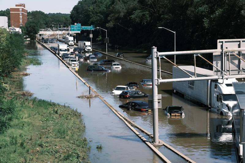 Cars sit abandoned on the flooded Major Deegan Expressway in the Bronx following a night of heavy wind and rain from the remnants of Hurricane Ida on September 2, 2021 in New York City. AFP