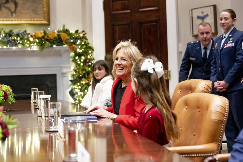 Ms Biden in the Roosevelt Room with children of military families. AP