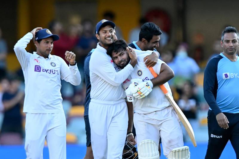 Rishabh Pant celebrates victory with his India teammates after Day 5 of the 4th Test against Australia. Getty